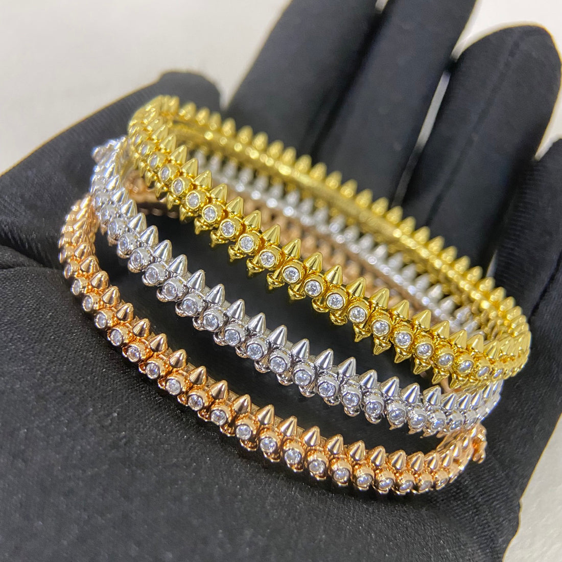 Avelora pavé stud bangles in three color finishes