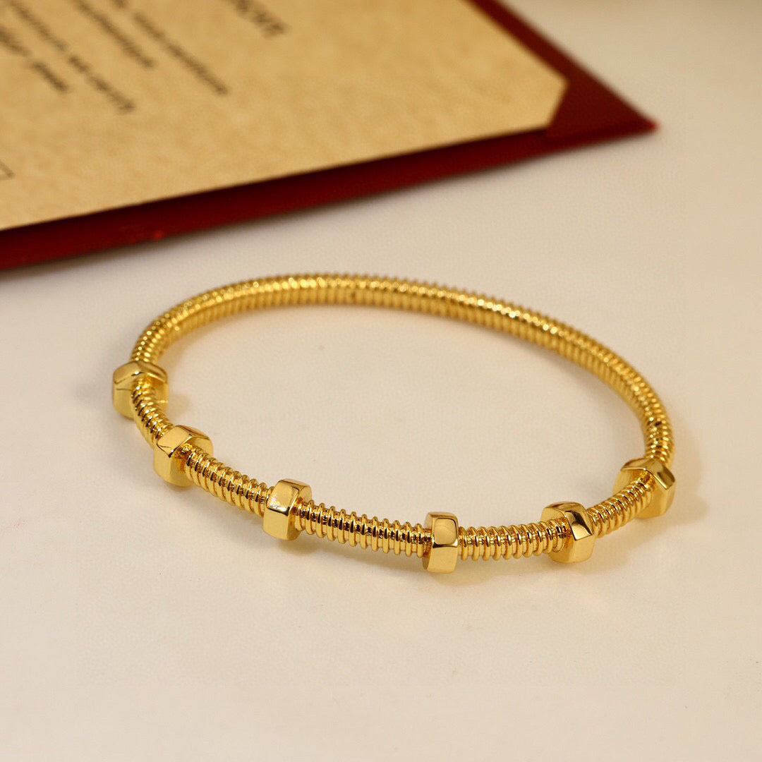 Gold flexible screw bangle