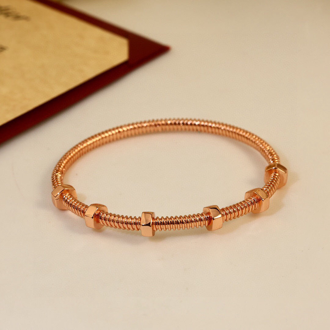 Rose gold flexible screw bangle