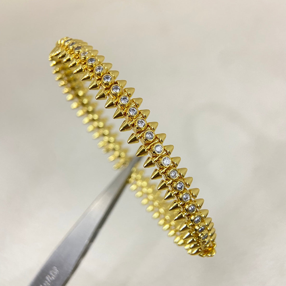 Avelora pavé stud bangles in three color finishes
