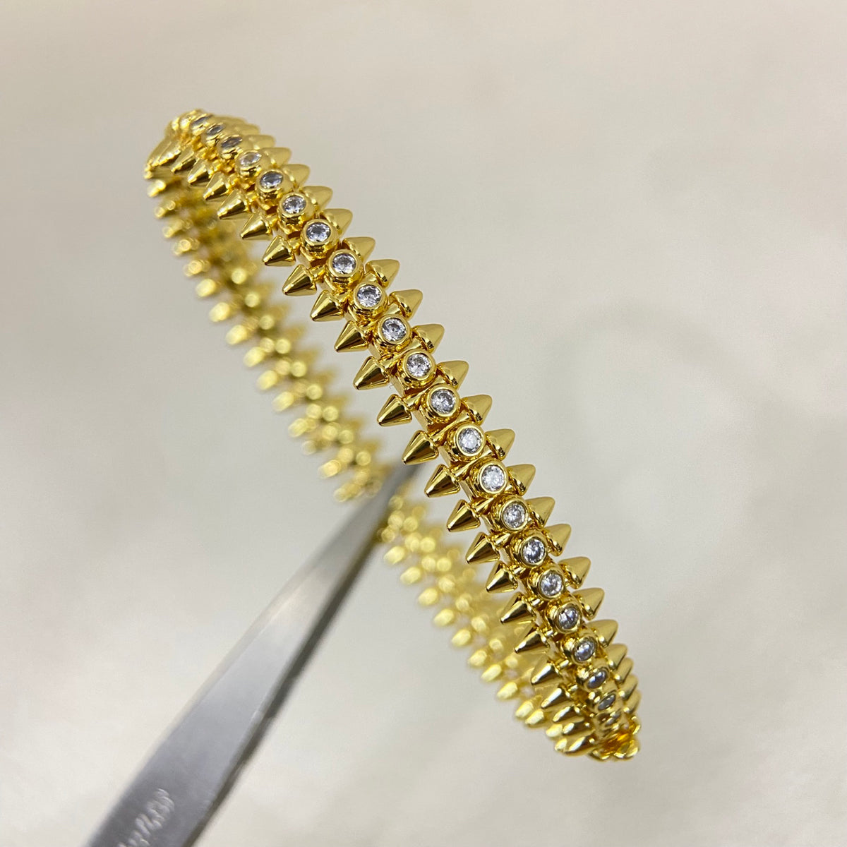 Avelora pavé stud bangle in Gold