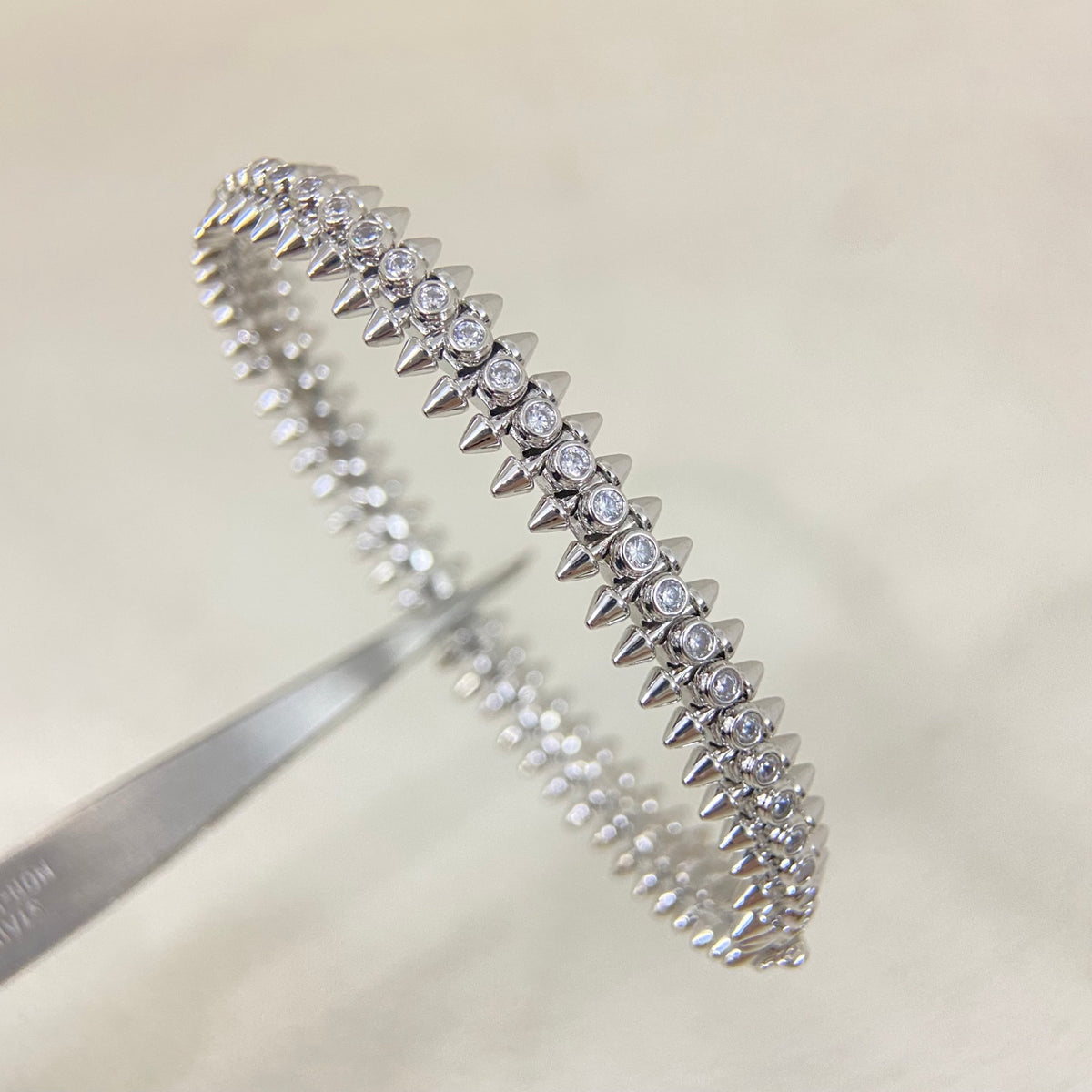 Avelora pavé stud bangle in Silver
