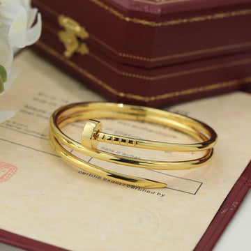 Avelora double-wrap nail bangle in Gold