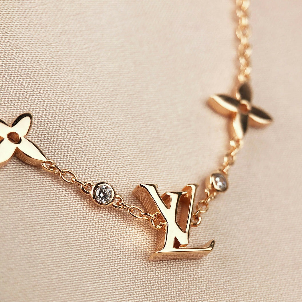 [Avelora Jewelry ]STAR AND SUN 7 MOTIFS GOLD BRACELET