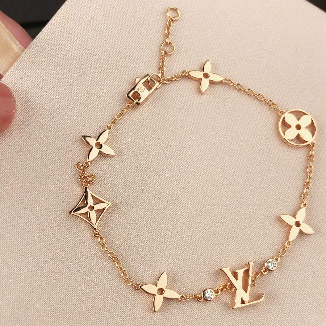 [Avelora Jewelry ]STAR AND SUN 7 MOTIFS GOLD BRACELET