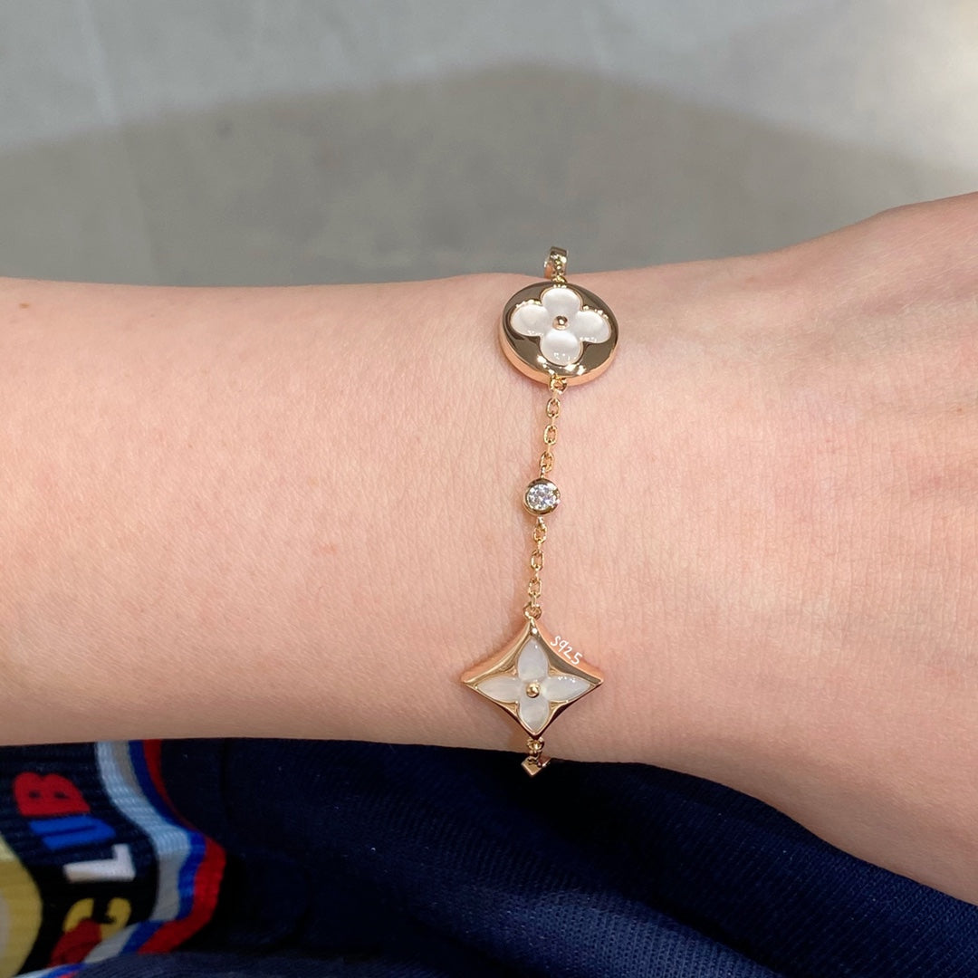 [Avelora]STAR AND SUN 4 MOTIF WHITE MOP ROSE GOLD BRACELET