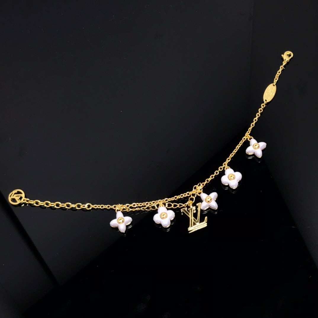 [Avelora]LOGO 6 MOTIF STAR AND SUN GOLD BRACELET