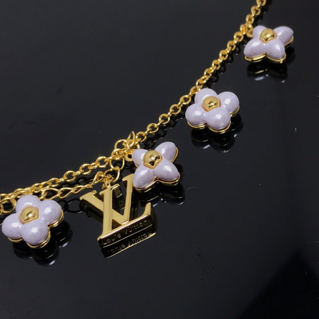 [Avelora Jewelry ]LOGO 6 MOTIF STAR AND SUN GOLD BRACELET