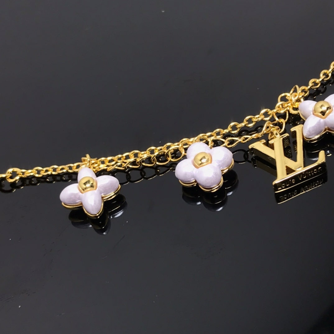 [Avelora Jewelry ]LOGO 6 MOTIF STAR AND SUN GOLD BRACELET