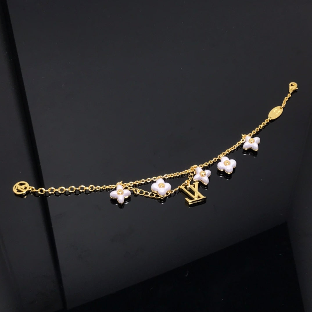 [Avelora]LOGO 6 MOTIF STAR AND SUN GOLD BRACELET