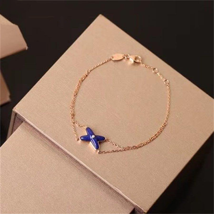 [Avelora Jewelry ]Hollow Design Four-Leaf Clover Flower Shape Bracelet